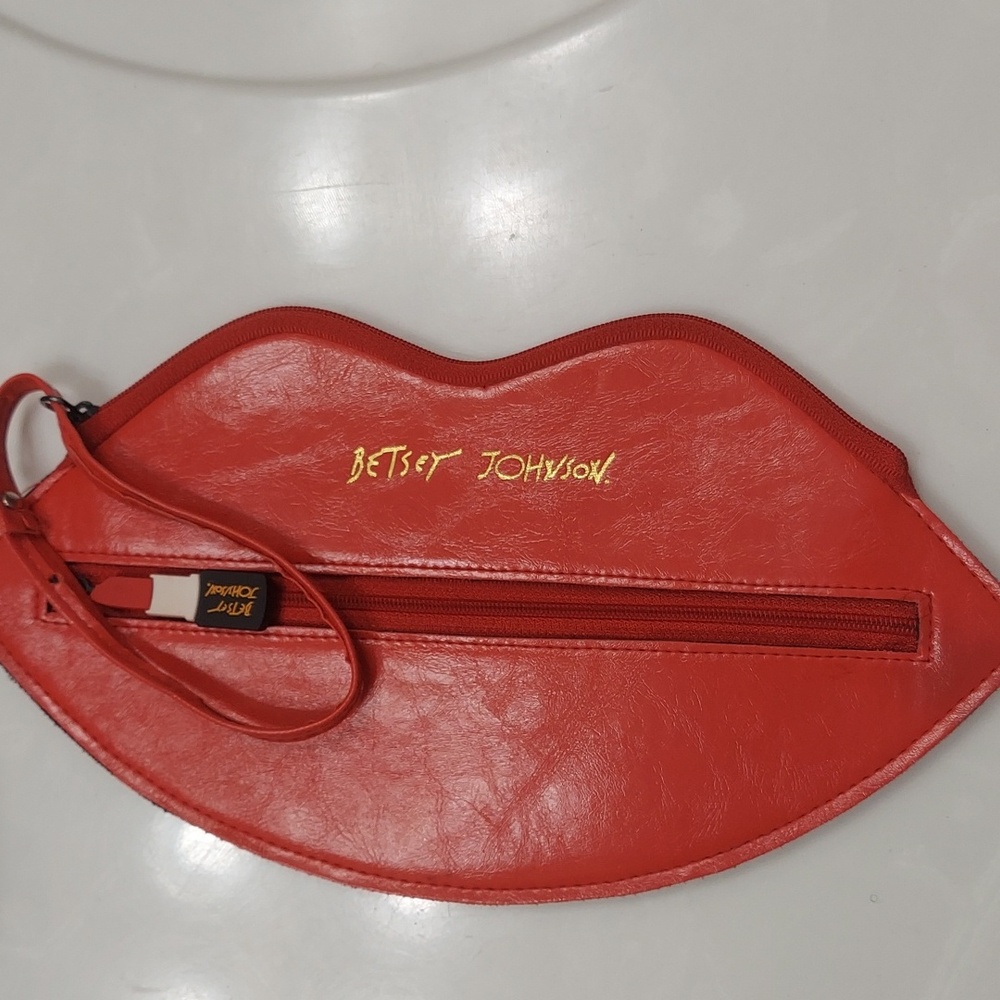 Betsey Johnson lip wristlet